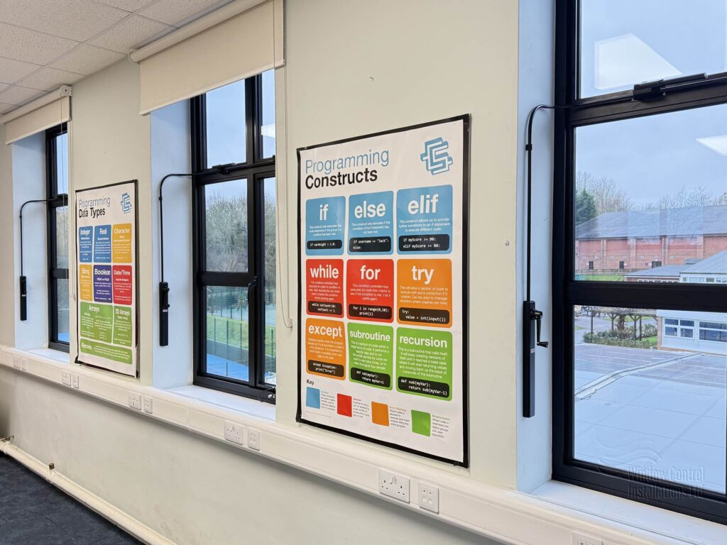 Wide view of manual window controls installed in a Bishop Stortford College classroom for natural ventilation.