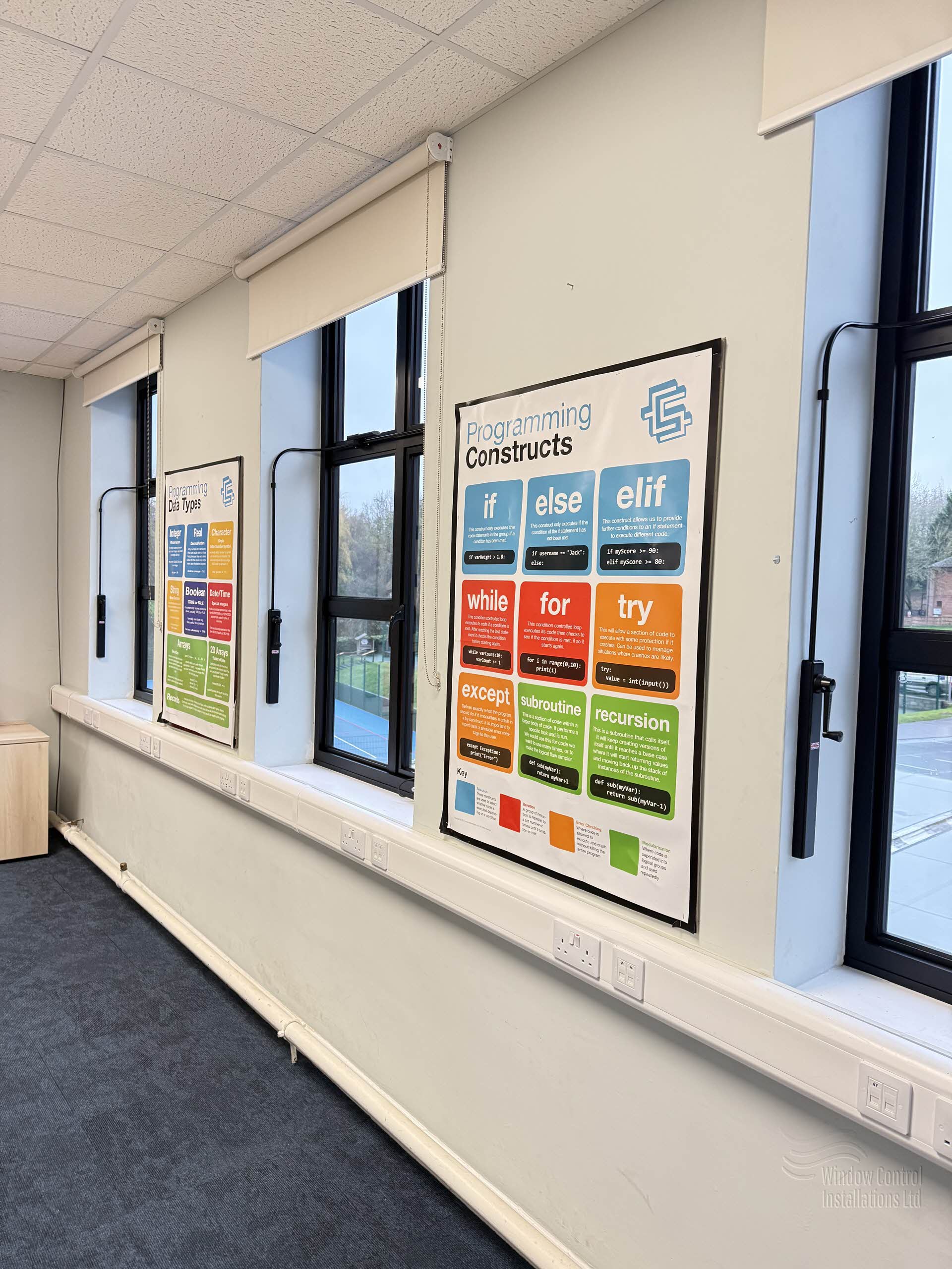 Completed school ventilation upgrade featuring newly installed manual window control systems.