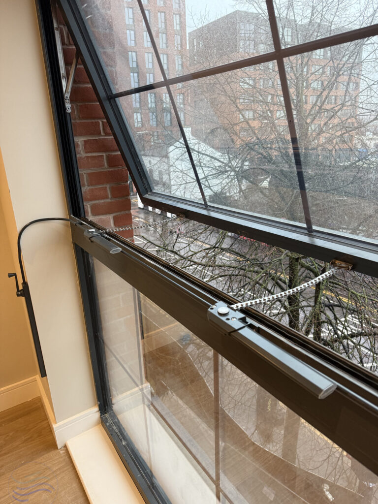 Close up of a manual window control system fully installed, using the Teleflex Clearline Midi XL control and Dual Teleflex 380 Chain Operators, providing maximum natural ventilation