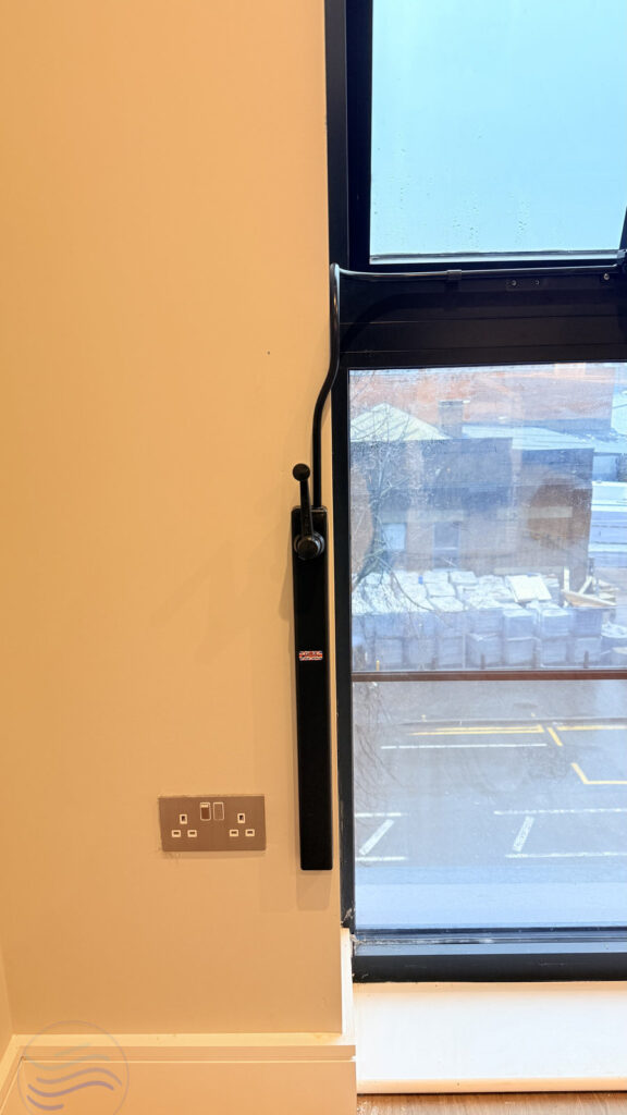 Professional installation of manual window controls for residential ventilation at Galliard Homes, Birmingham.
