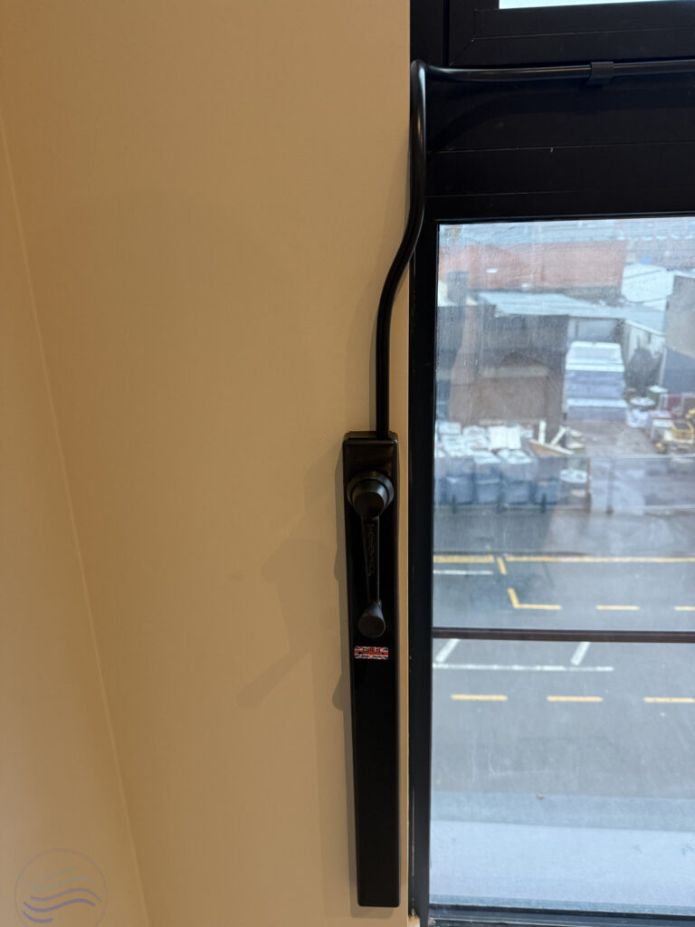 Vertical detail of the Midi XL Operator and matching black conduit for the Galliard Homes Lower Essex Street development.